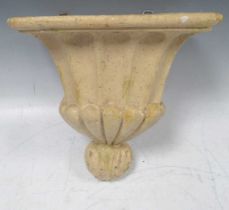 A painted plaster wall bracket in the neoclassical style 30 x 30 x 24cm