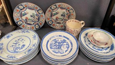 Six blue and white Chinese plates decorated with a bird in a tree, together with nine blue and white