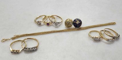 An 18ct gold dress ring, along with seven gem set rings, two buttons and a chain, all tested as 18ct