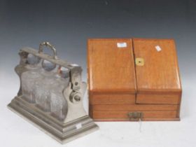 An electrploated tantalus 27 x 42 x 18cm; together with a Victorian oak stationery box 30 x 38 x