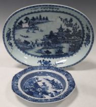 An 18th century Chinese oval dish, decorated with the willow pattern (old repair), 37 x 29cm ;