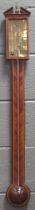 A 19th century mahogany stick barometer with satinwood stringing. Robert Tyter of Melton. 97cm High