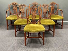 A set of six Hepplewhite style mahogany shield back dining chairs with green stuff-over seats. (6)