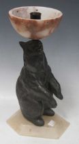 Two Art Deco lamp bases, the first bronzed spelter in the shape of a bear 33cm high, the other