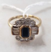 A sapphire and diamond cluster ring, hallmarked 9ct gold, weight 3.3g The three baguette diamonds