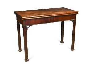 An early George III fold-over supper table,