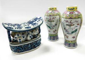 A pair of Chinese Cantonese porcelain vases, late Qing Dynasty, circa 1900,