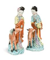 Two similar Chinese enamelled porcelain figures of the Immortal Magu with deer, late Qing Dynasty,