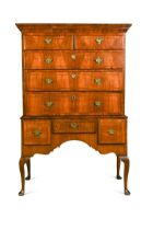 A walnut chest on stand, early 18th century,