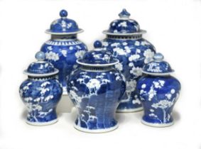 A group of five Chinese blue and white porcelain vases, Qing Dynasty, 19th century,