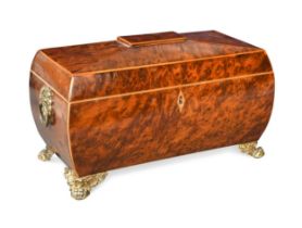 A Regency burr yew and inlaid bombe form sarcophagus tea caddy,