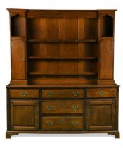 A provincial George III oak dresser,