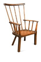 A primitive ash and birch stick back armchair,