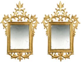 A pair of Continental carved gilt frame wall mirrors, 19th century,