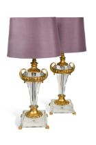A pair of contemporary lucite table lamps,