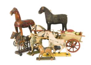 A group of eight naive models of horses, late 19th/early 20th century,