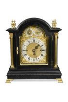 A late Victorian ebonised chiming table clock,