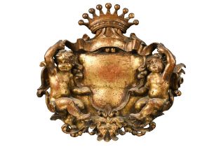 A gilt carved armorial cartouche, 17th or 18th century,