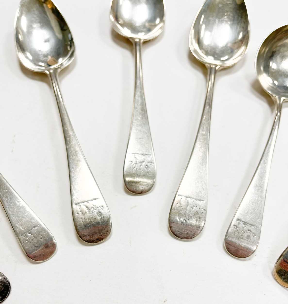 A 34-piece set of George III 18th century silver flatware with 55 additions, - Image 2 of 4