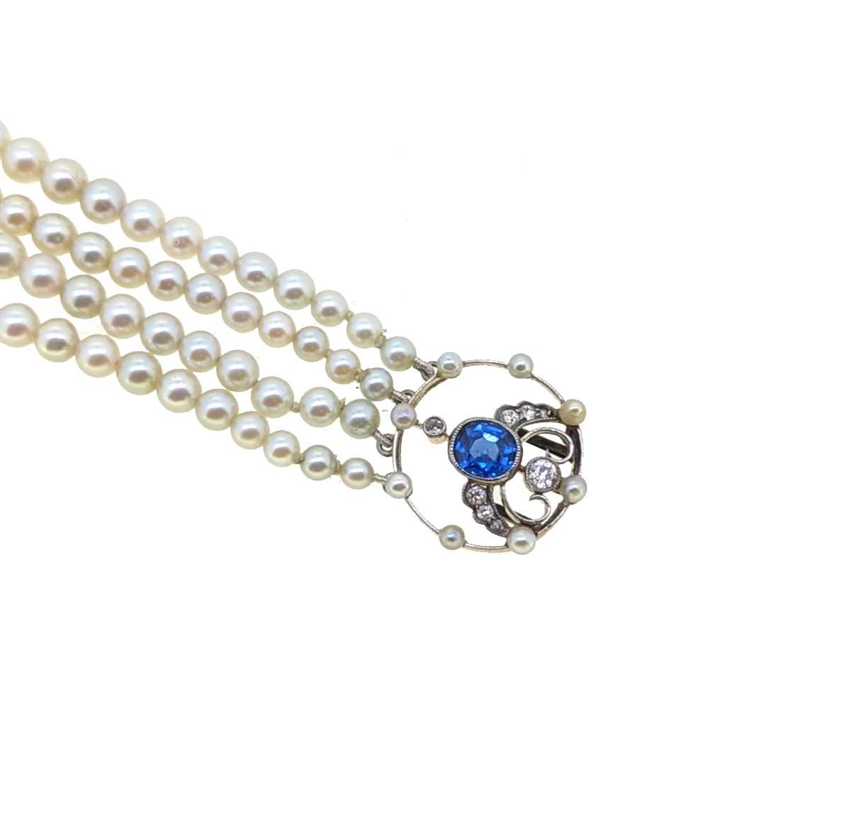 A four row pearl bracelet with a sapphire and diamond clasp, - Image 2 of 4