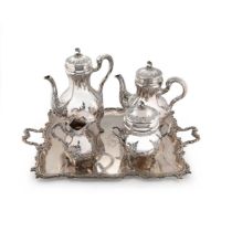 An early 20th century Belgian metalwares silver 4-piece tea set with accompanying tray,