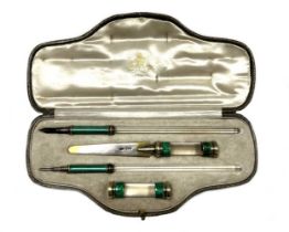 A George V silver, enamel and rock crystal writing set, mark of Asprey & Company,