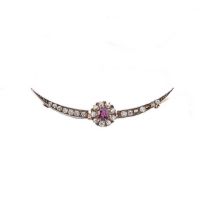 A ruby and diamond crescent brooch,