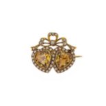 An Edwardian citrine and split pearl brooch,