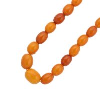 An amber bead necklace,