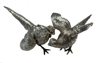 A brace of 20th century German metalwares silver pheasants,
