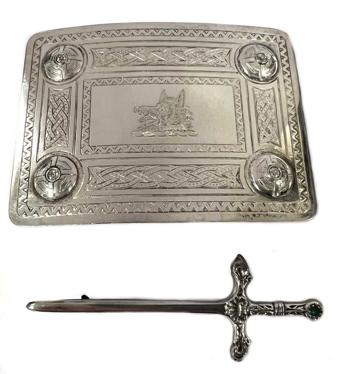 A 20th century silver and diamond set Highlander's dress belt buckle and a silver kilt pin,