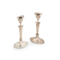 A pair of Edward VII silver library candlesticks,