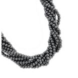 Tiffany & Co - A Hematite torsade necklace,
