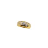 An 18ct gold diamond set scatter ring,