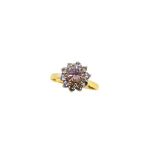 An 18ct gold diamond cluster ring,