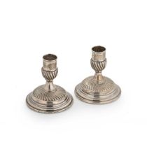 A pair of Victorian silver library candlesticks,