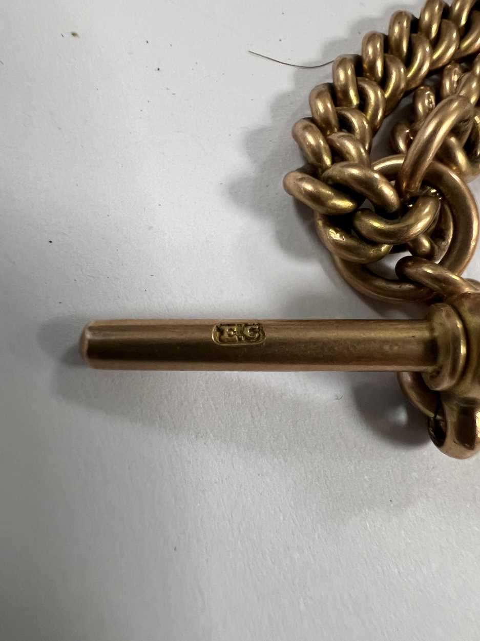 An early 20th century 9ct gold 'Albert' watch chain with attachment, - Image 5 of 9