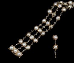Charles de Temple - A pearl and diamond 'Wrapped' bracelet, together with a matching single earring,