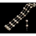 Charles de Temple - A pearl and diamond 'Wrapped' bracelet, together with a matching single earring,