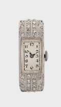 Spera Watch Company, Tramelan - A Swiss platinum diamond set cocktail wristwatch head,