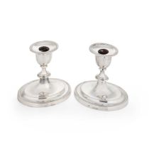 A pair of Victorian silver library candlesticks,