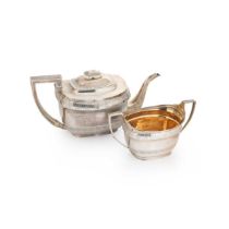 A George III silver teapot and sugar bowl,
