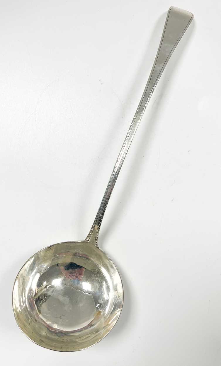 A George III 18th century silver soup ladle,