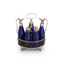 A silver plated 5 bottle cruet stand with unusual blue glass bottles,