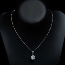 A single stone diamond pendant,