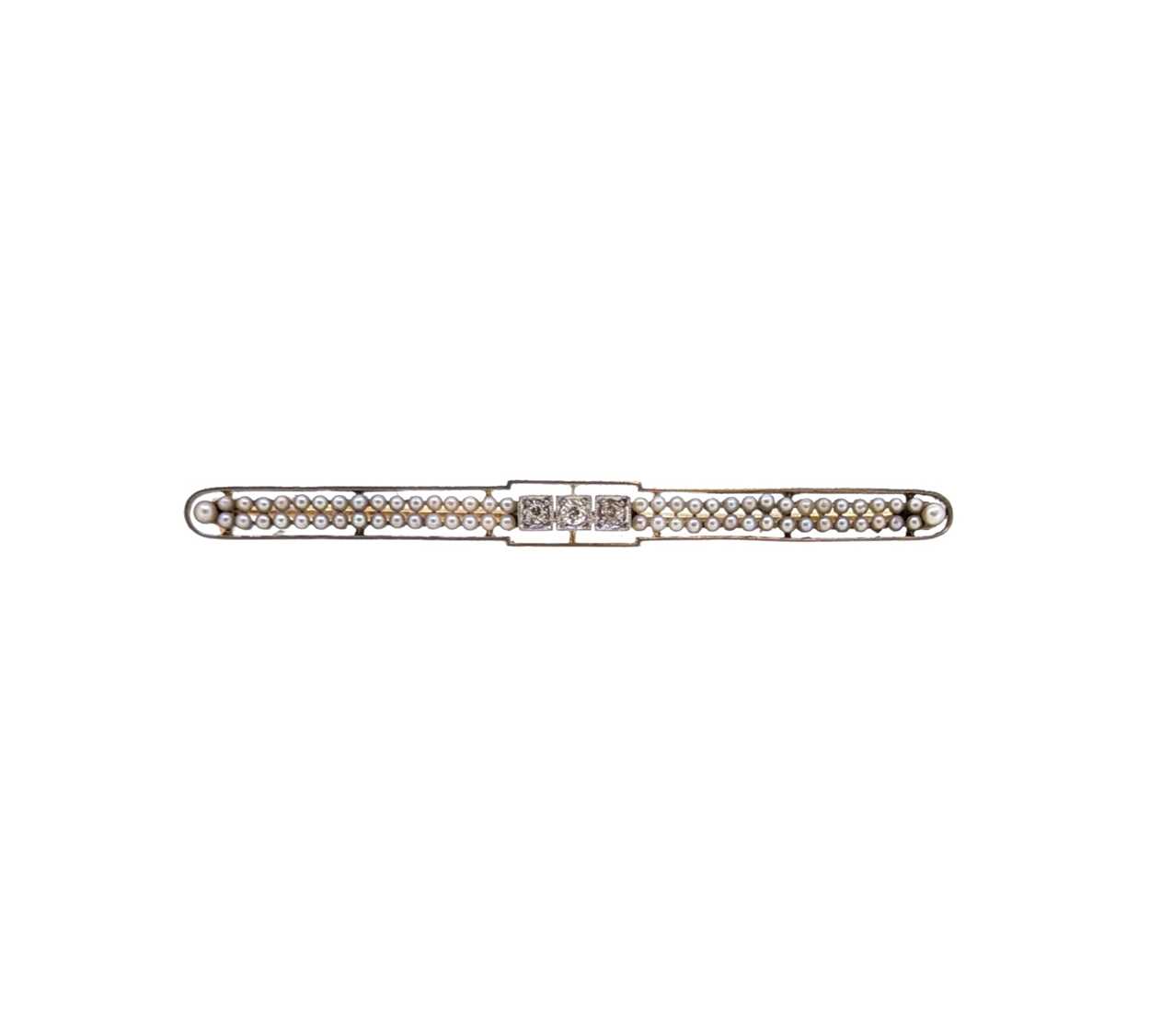 A diamond and seed pearl bar brooch,