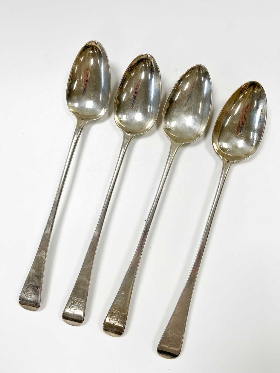 A set of 4 George III 18th century silver basting spoons,