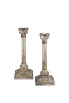 A pair of early 20th century German metalwares silver plated candlesticks,