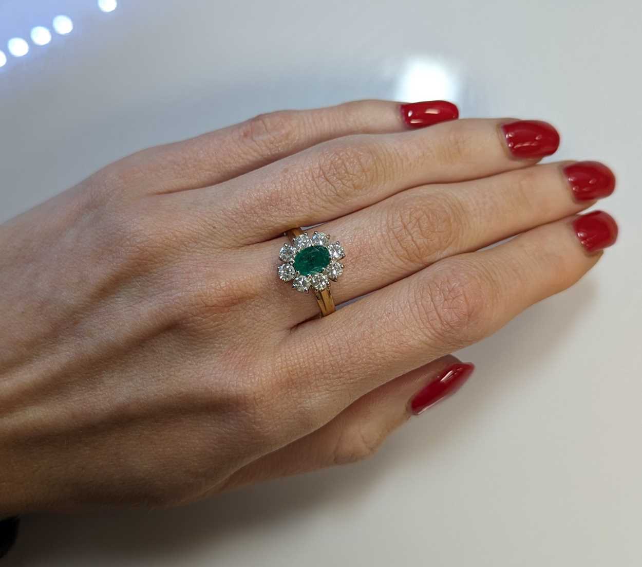 An 18ct gold emerald and diamond cluster ring, - Image 3 of 3