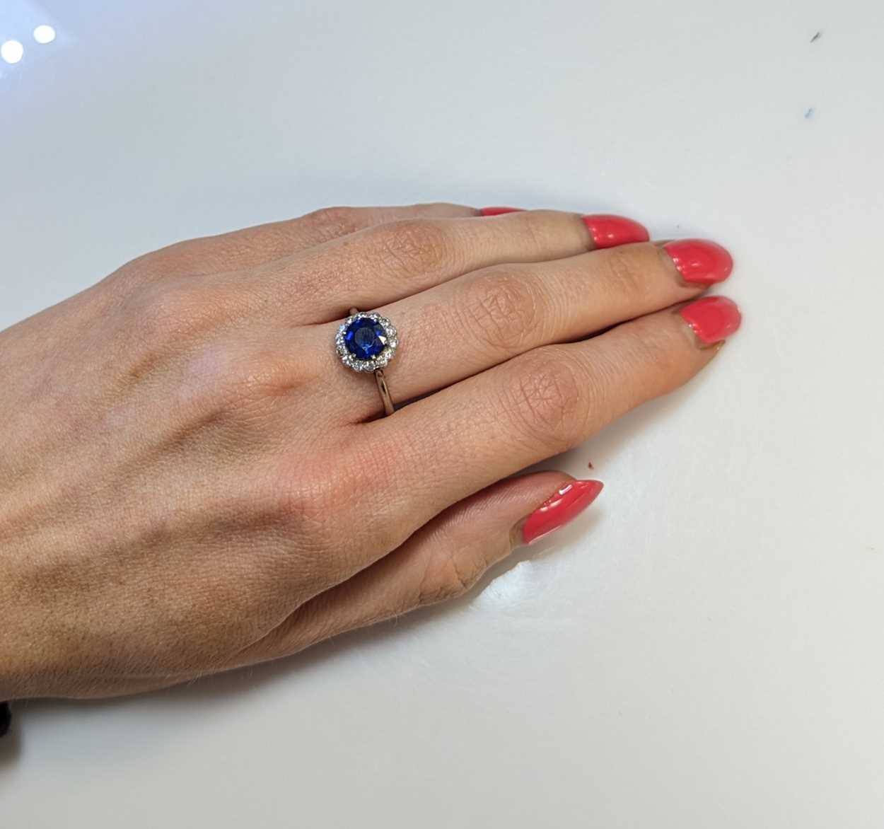 A mid 20th century sapphire and diamond cluster ring, - Image 5 of 5